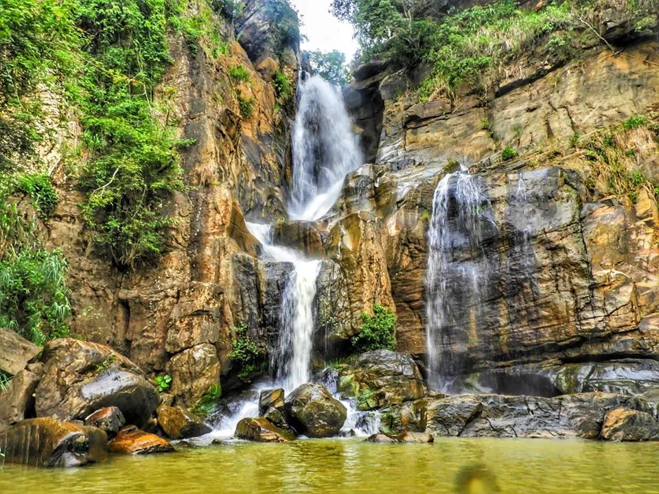 The shallow cold natural pool below Besama Water Fall